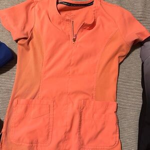 Koi lite Slim fit coral scrub top